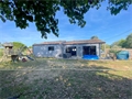 Maison en bois à la vente